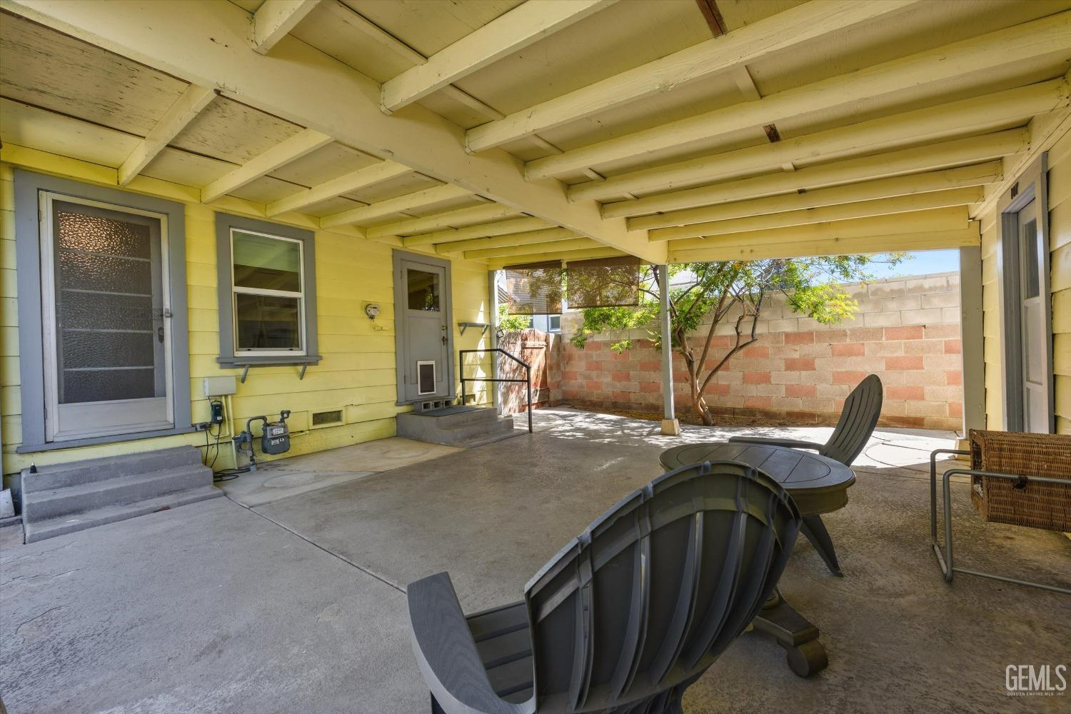 Undisclosed Address Bakersfield, CA 93305 - Photo 30 of 39 a view of a porch with furniture and a window