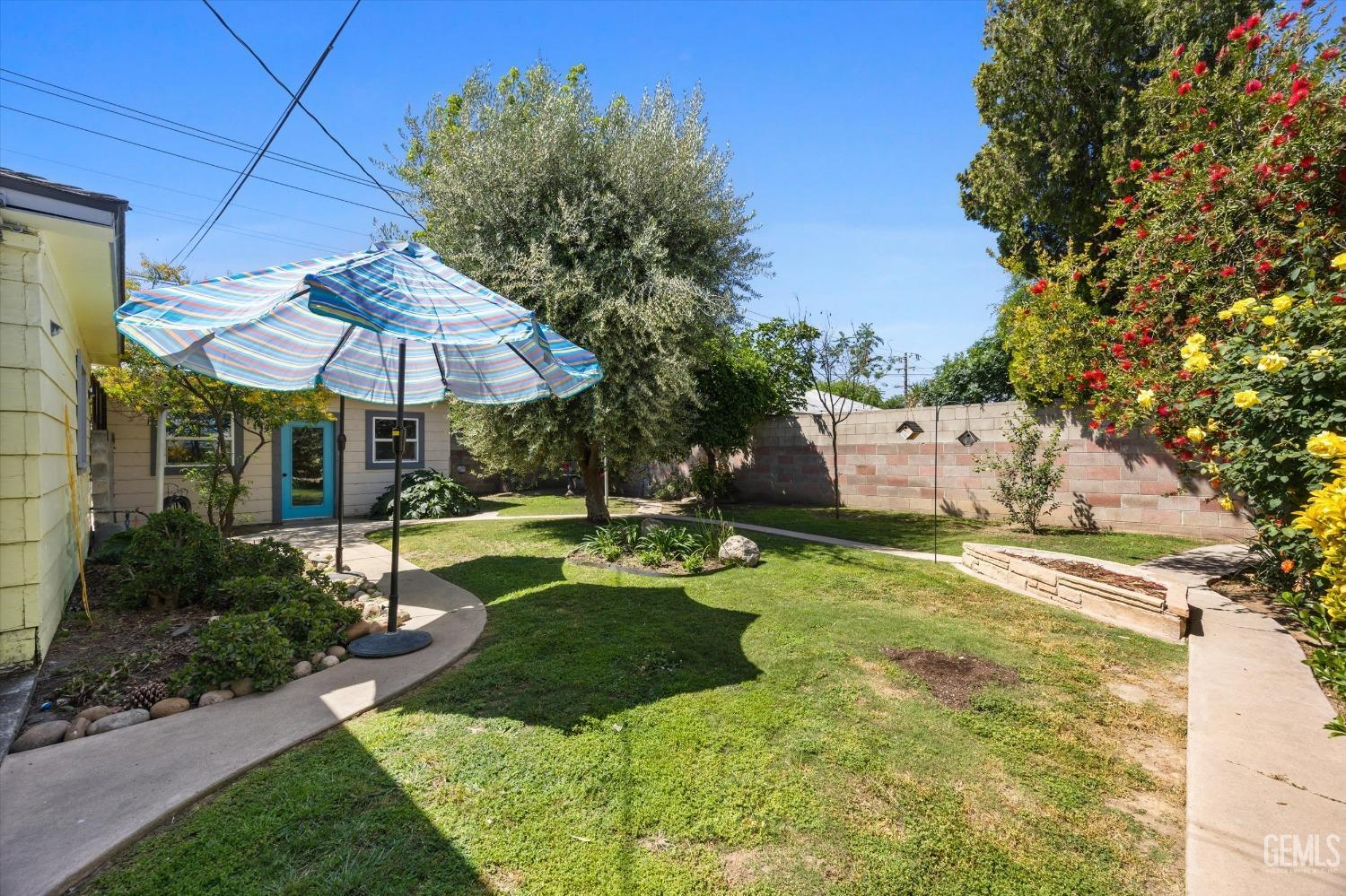 Undisclosed Address Bakersfield, CA 93305 - Photo 36 of 39 a view of a house with backyard and sitting area