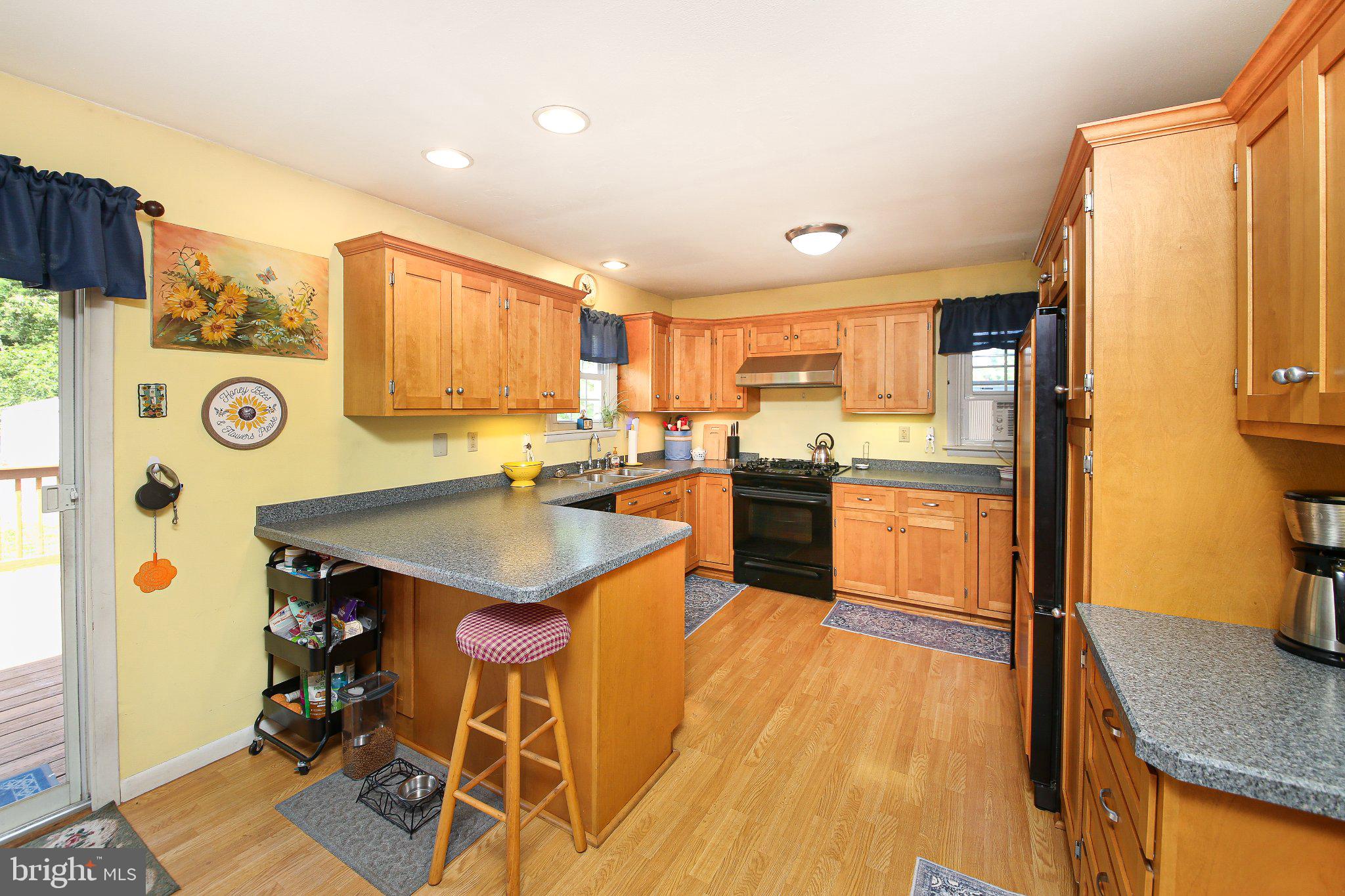 3134 Wild Run Road Pennsburg, PA 18073 - Photo 4 of 33 Sunny kitchen with warm wood accents.