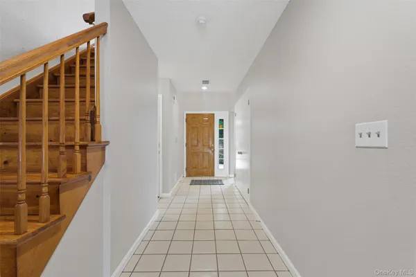 a view of hallway with stairs