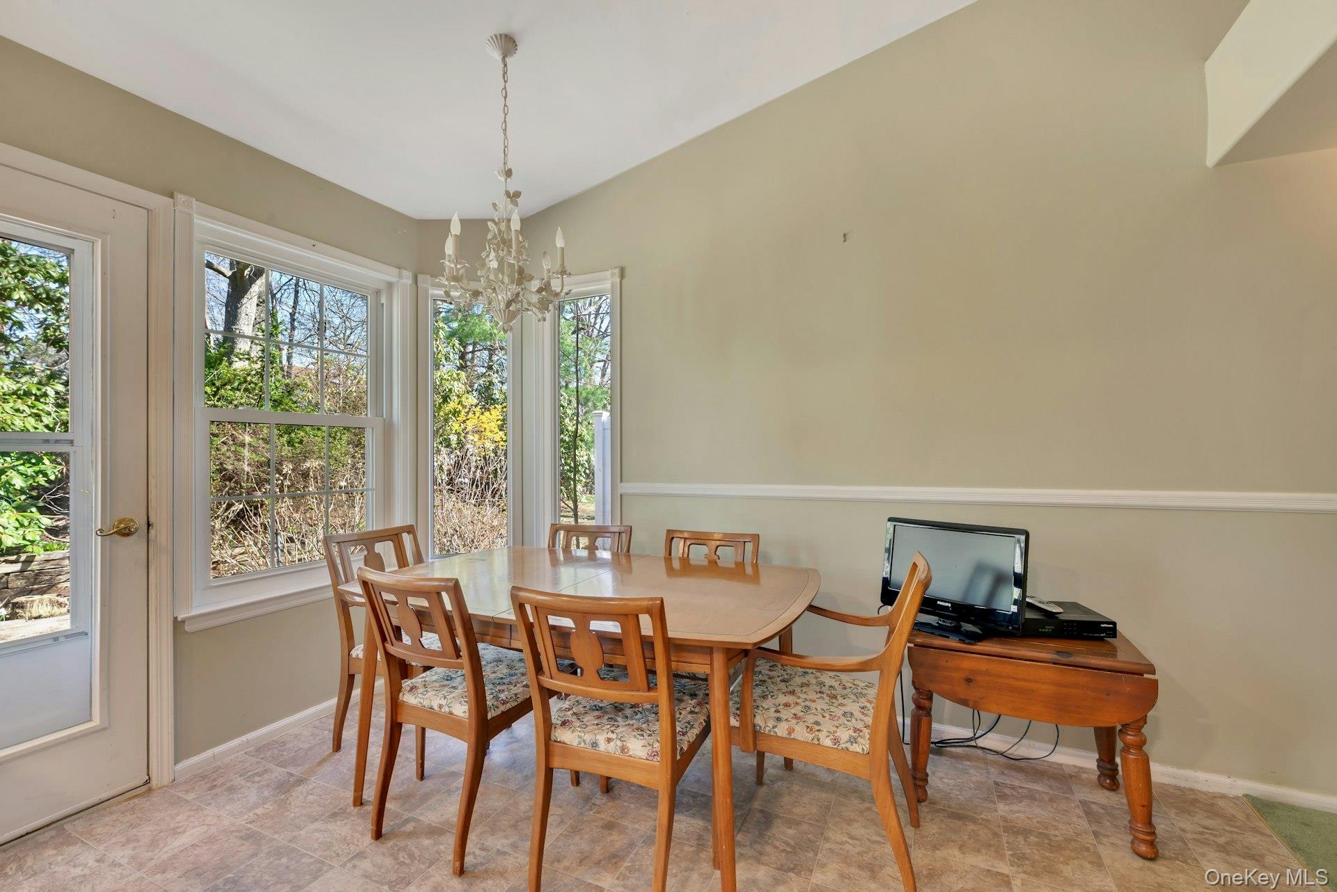 82 Glen Drive Ridge, NY 11961 - Photo 23 of 26 Bright kitchen dining area
