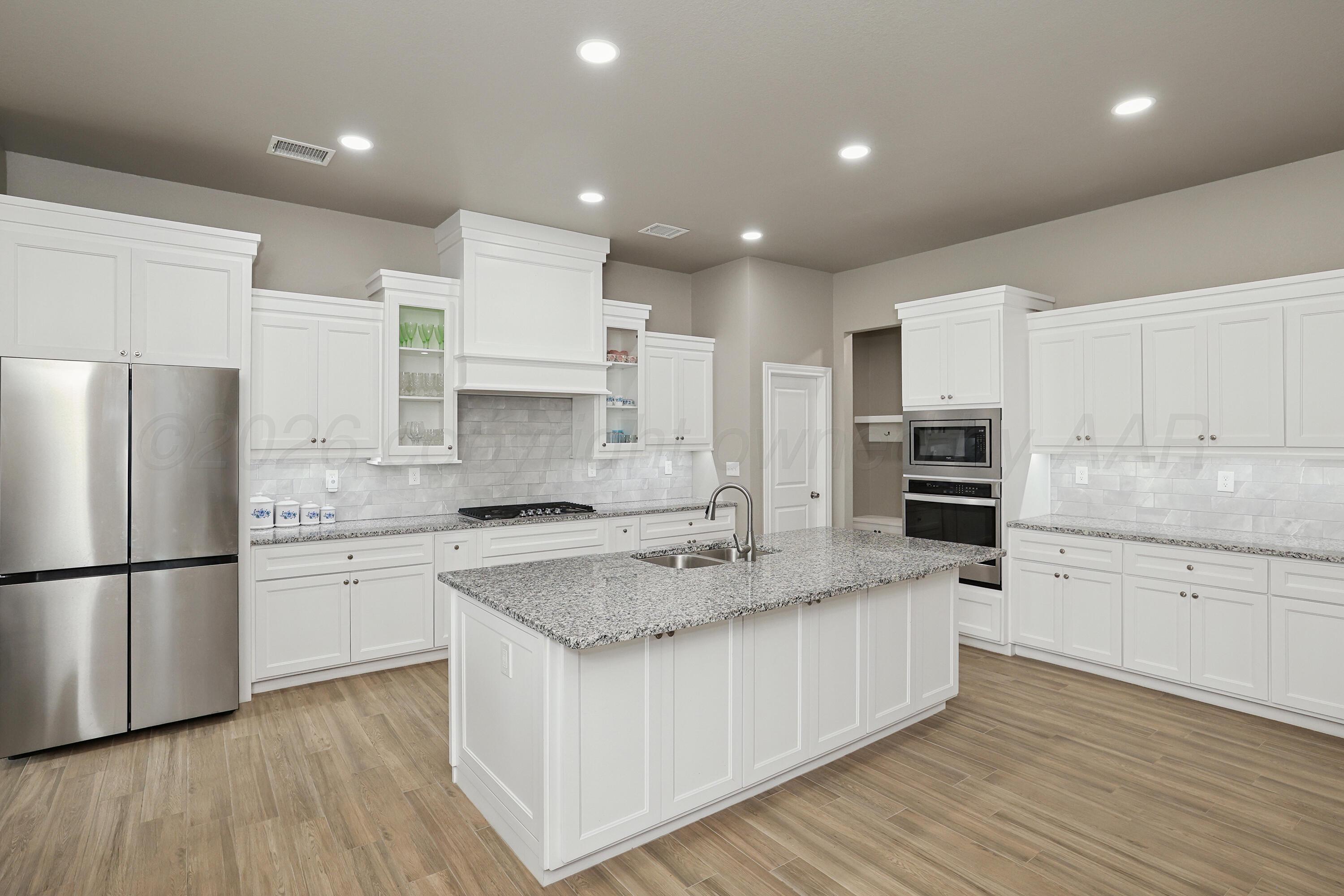 13466 Antenor Road Amarillo, TX 79124 - Photo 10 of 48 8-Kitchen Island Storage