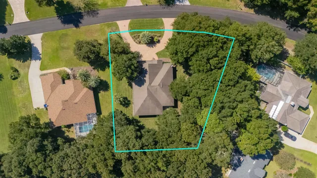 an aerial view of a house with a garden