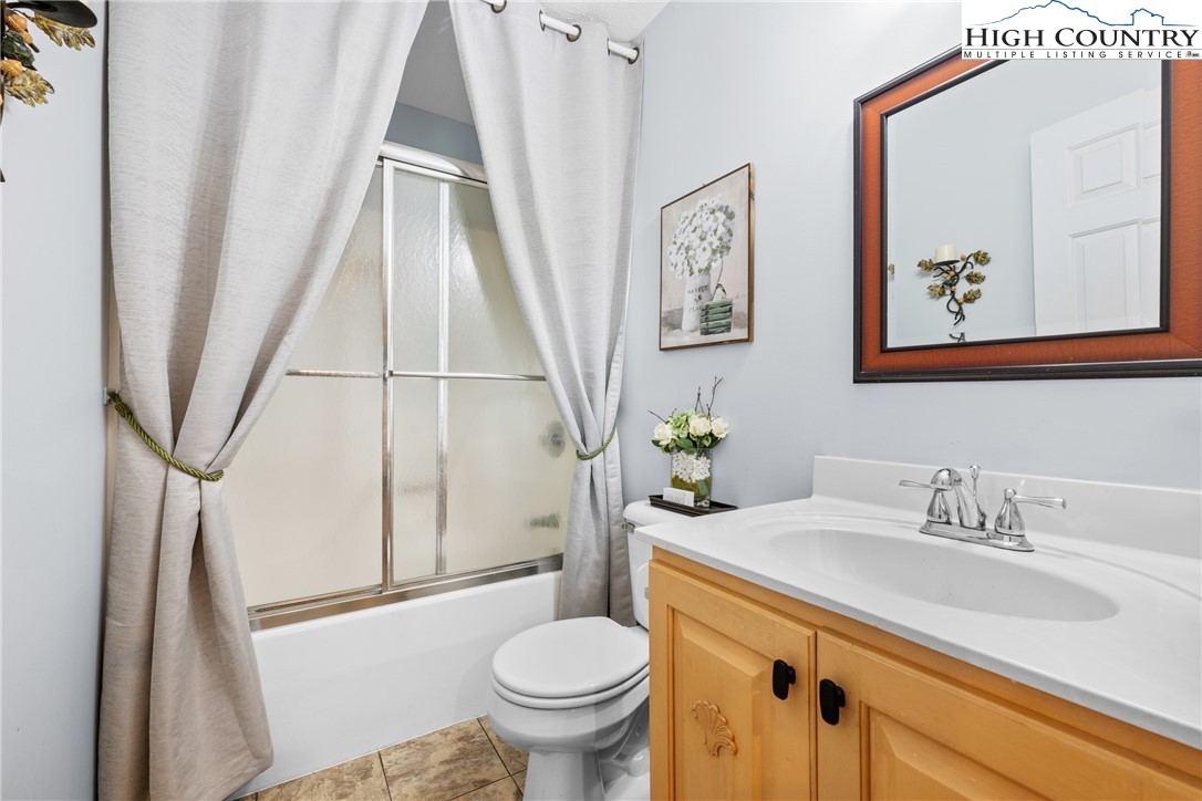 2587 Junaluska Road Boone, NC 28607 - Photo 30 of 47 a bathroom with a sink and toilet