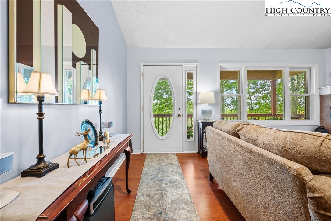 2587 Junaluska Road Boone, NC 28607 - Photo 4 of 47 a living room with furniture and a large window