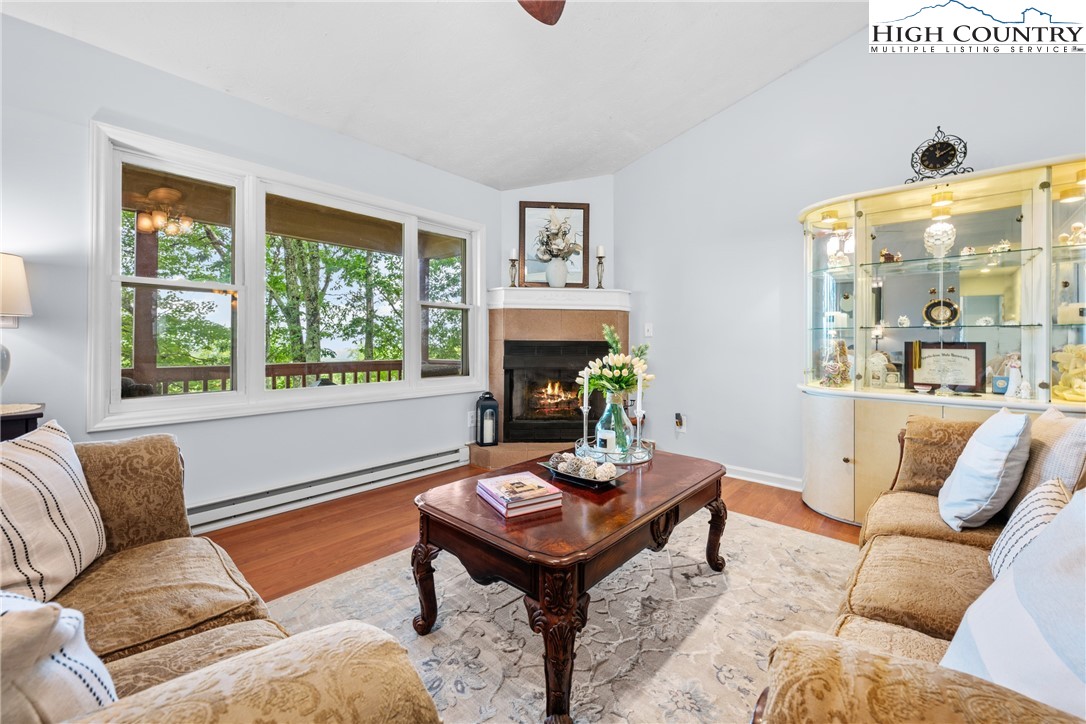 2587 Junaluska Road Boone, NC 28607 - Photo 7 of 47 a living room with furniture and a fireplace