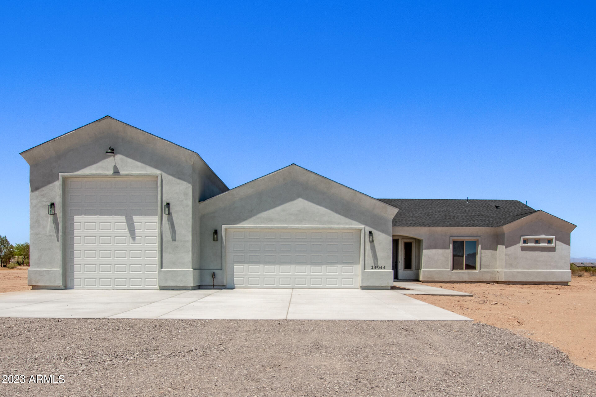 24044 West Redbird Road Wittmann, AZ 85361 - Photo 1 of 28 REDBIRD House Front