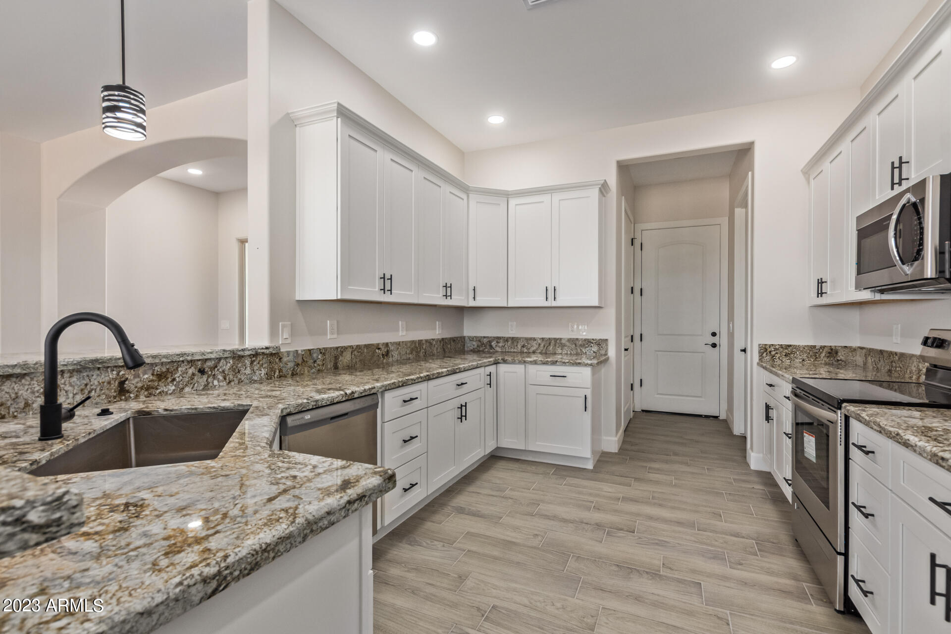 24044 West Redbird Road Wittmann, AZ 85361 - Photo 2 of 28 16 REDBIRD Kitchen 3