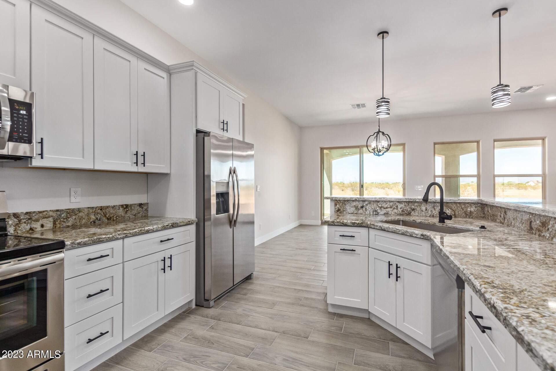 24044 West Redbird Road Wittmann, AZ 85361 - Photo 3 of 28 15 REDBIRD Kitchen 2
