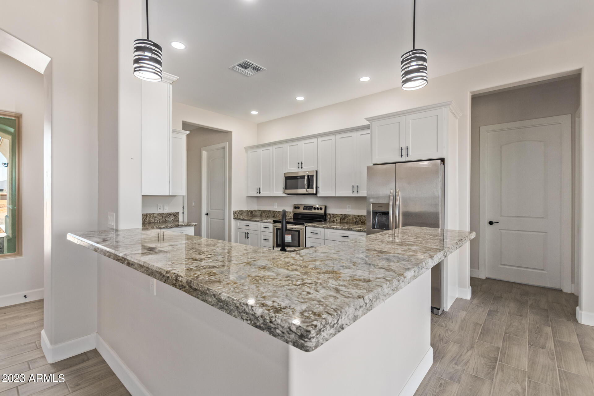 24044 West Redbird Road Wittmann, AZ 85361 - Photo 5 of 28 17 REDBIRD kitchen 4