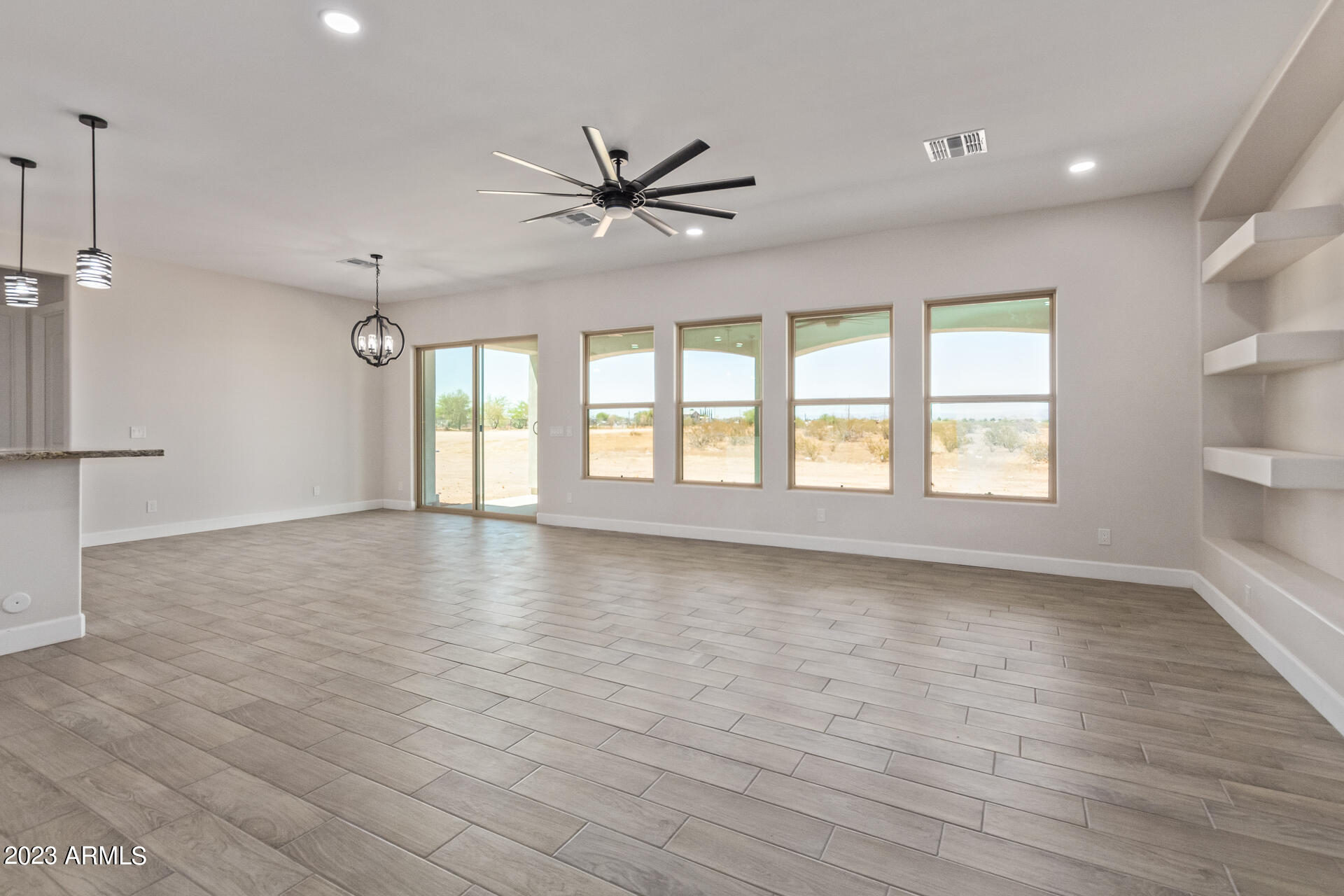 24044 West Redbird Road Wittmann, AZ 85361 - Photo 8 of 28 REDBIRD Living room 1