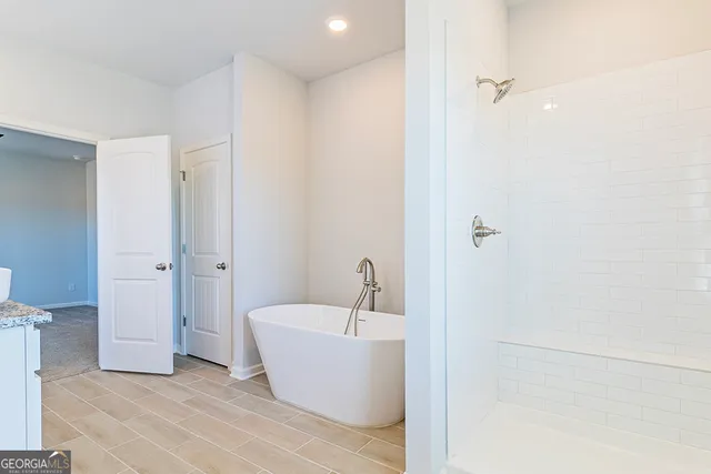 a very nice looking room with a bathroom