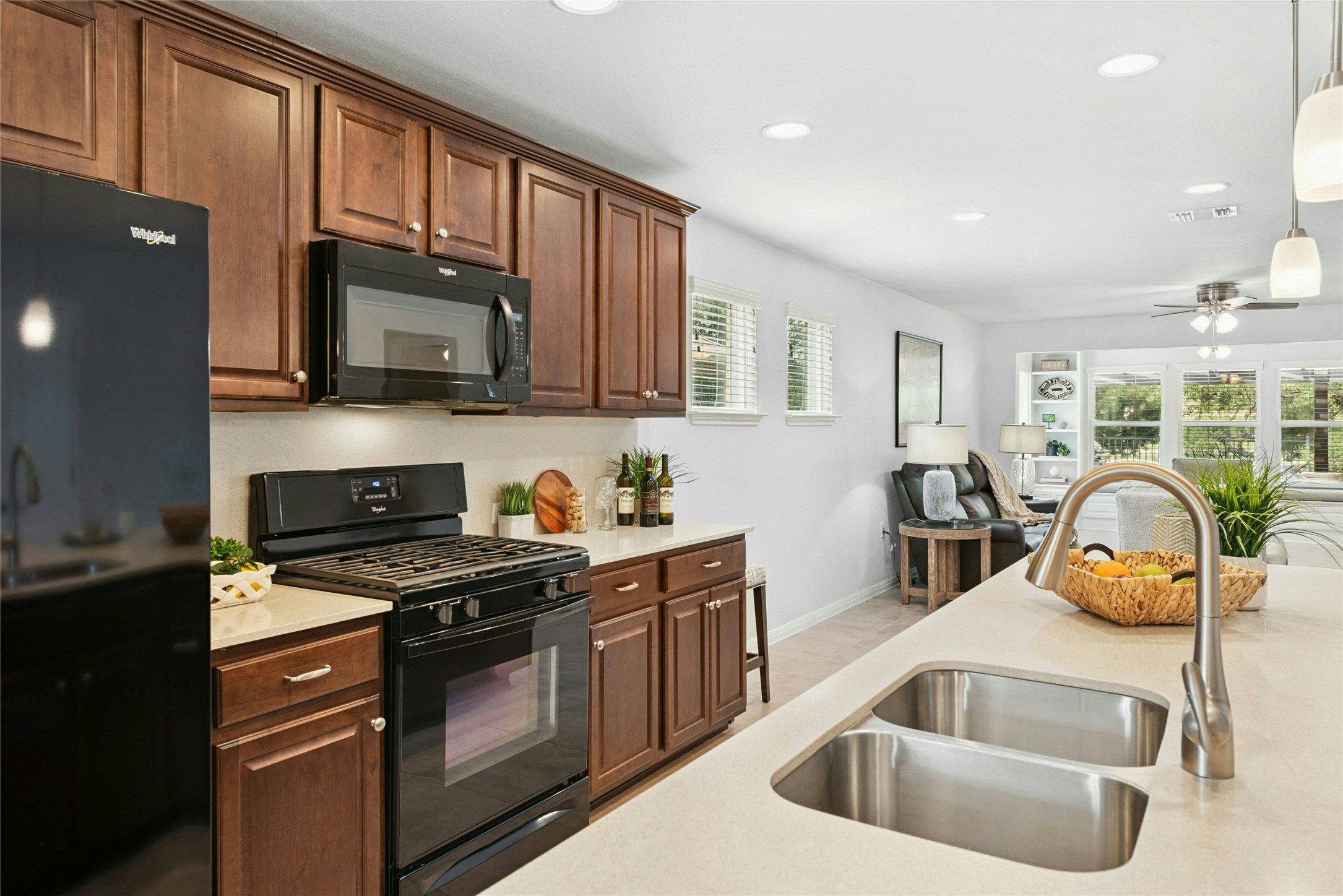 407 Fannin Court Georgetown, TX 78633 - Photo 11 of 40 a kitchen with a sink a stove and cabinets