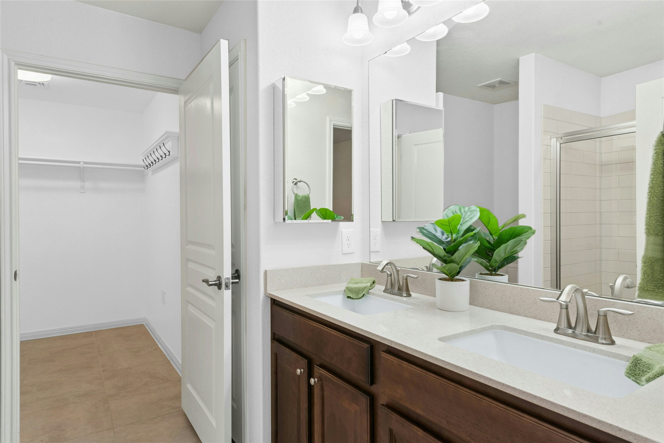 407 Fannin Court Georgetown, TX 78633 - Photo 18 of 40 a bathroom with a sink a vanity and a mirror