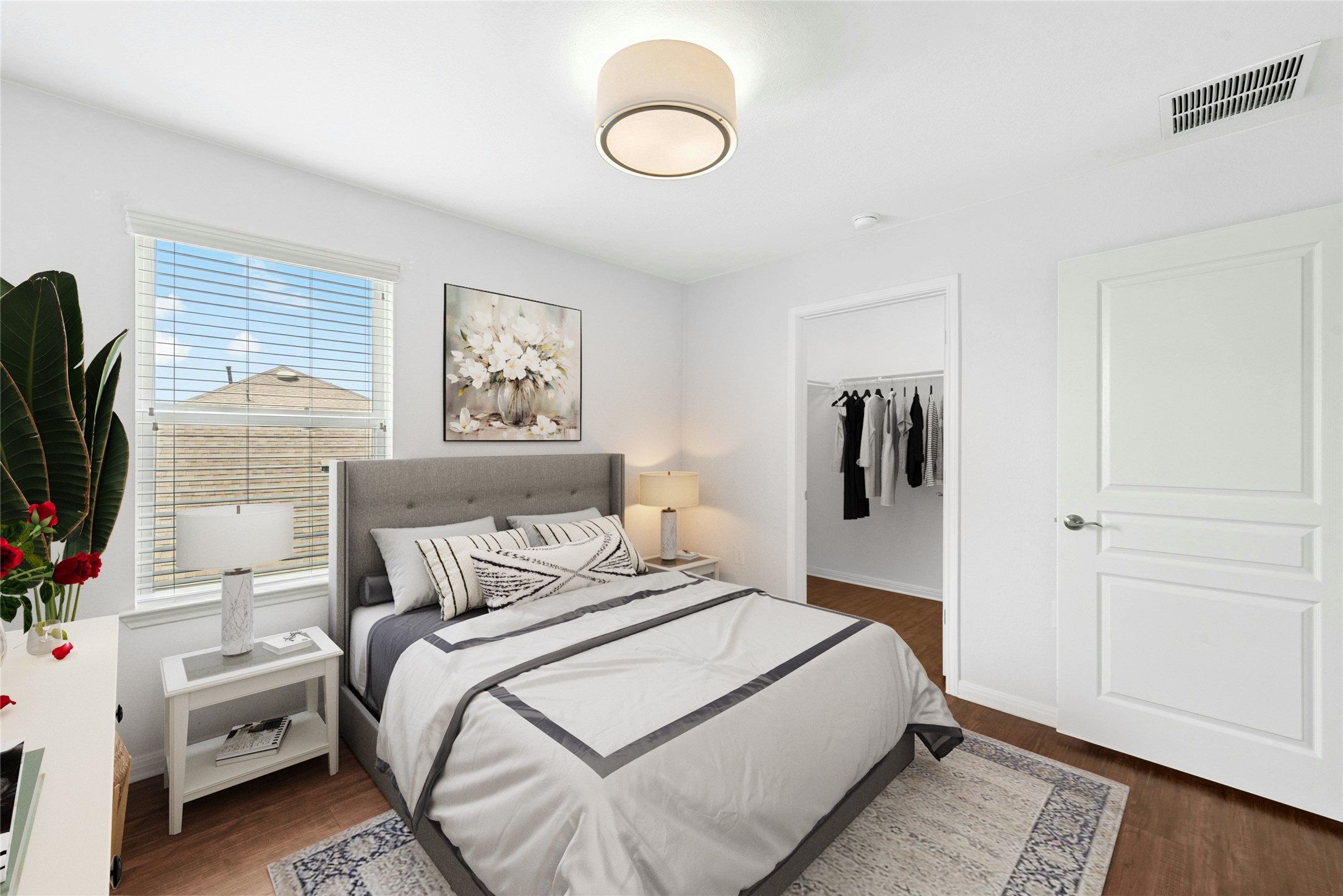 407 Fannin Court Georgetown, TX 78633 - Photo 24 of 40 a bedroom with a bed and a flat screen tv