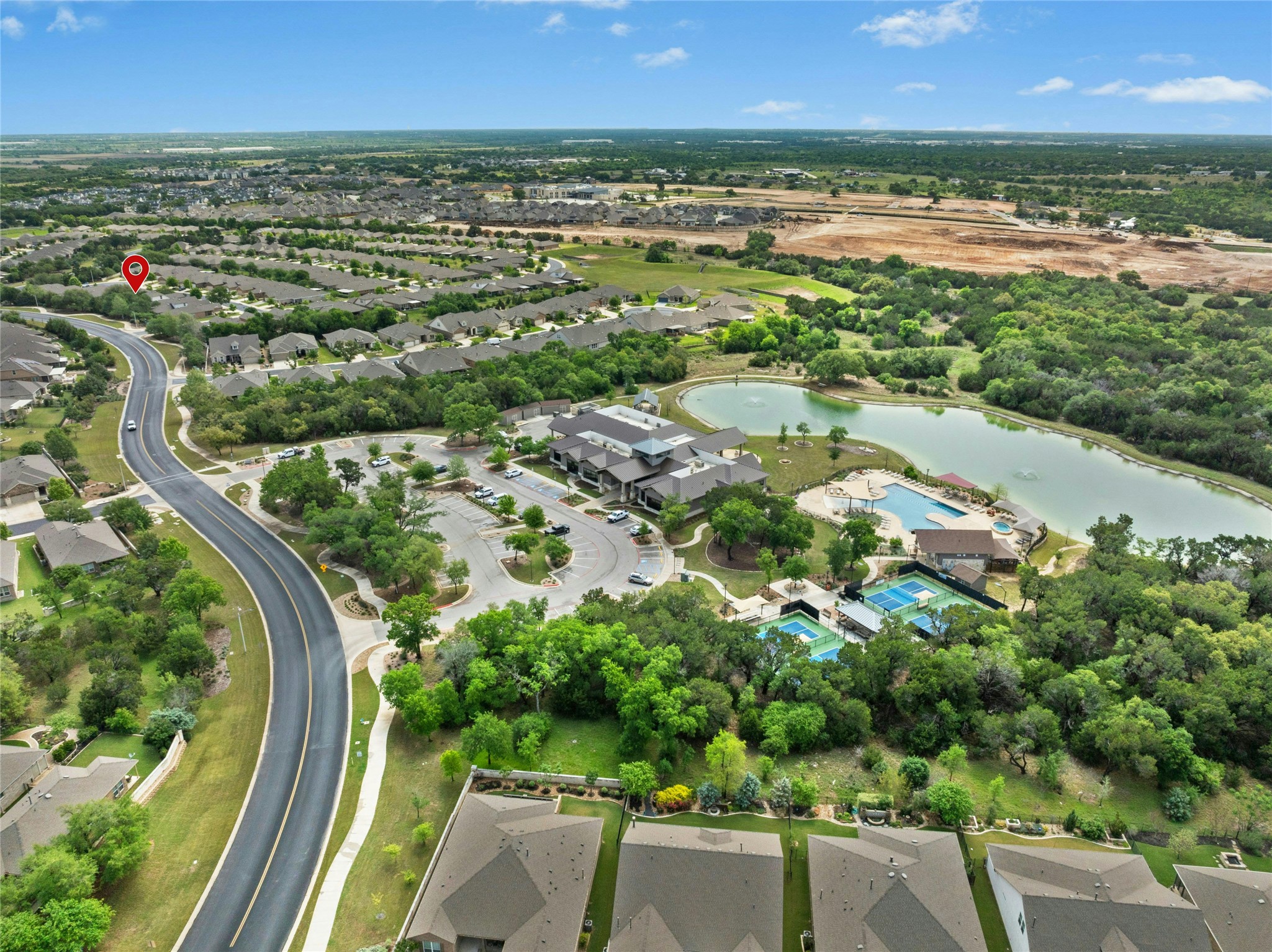 407 Fannin Court Georgetown, TX 78633 - Photo 35 of 40 an aerial view of residential houses with outdoor space and trees