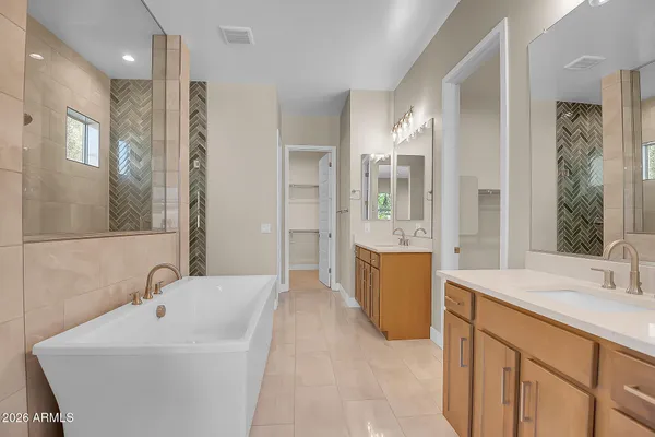 a kitchen with white cabinets
