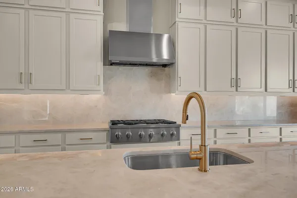 a bathroom with a double vanity sink mirror and double
