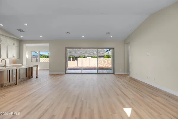 a view of a hallway with a bathroom