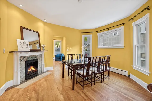 a view of a livingroom with furniture and a fireplace
