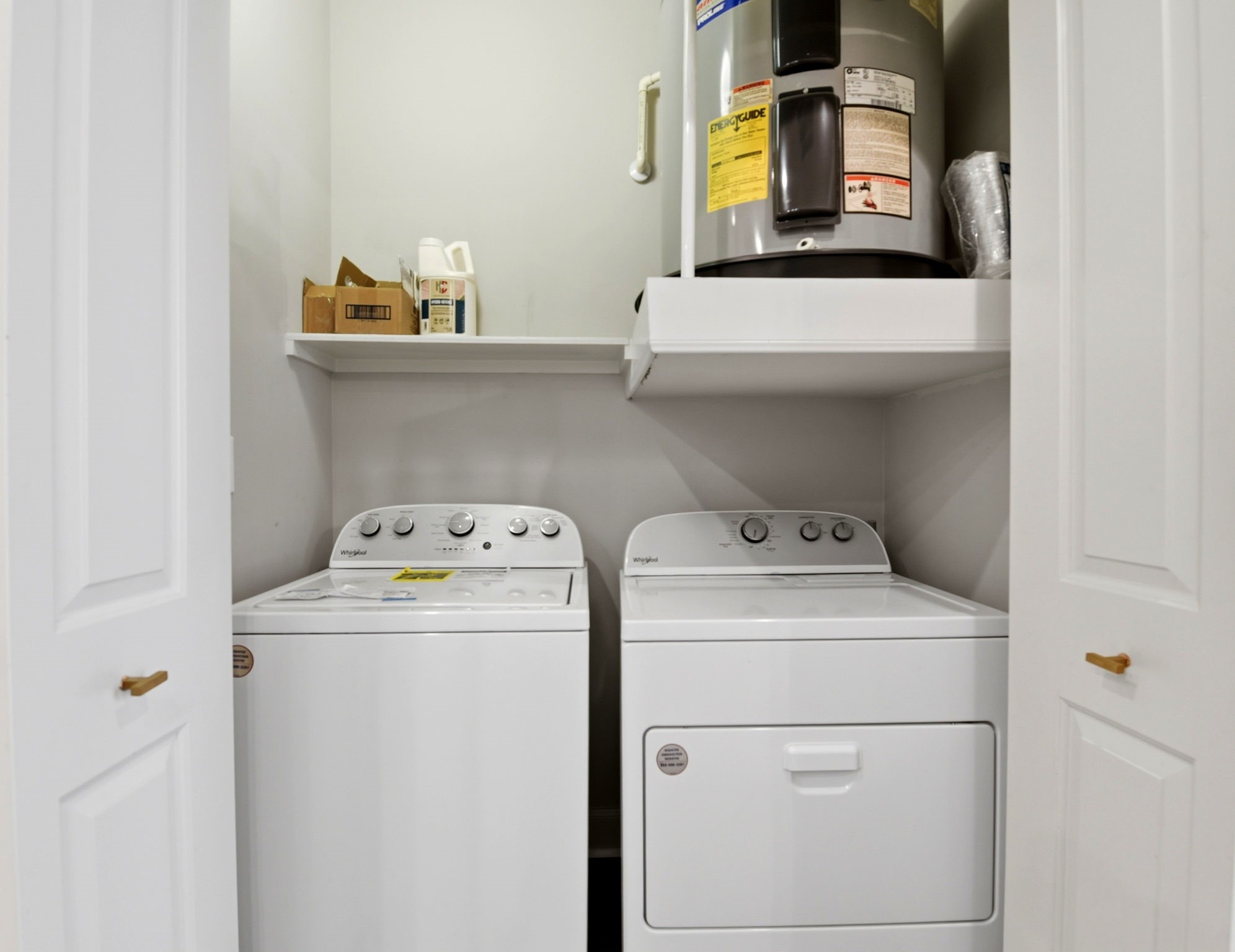 1010 Rosine Street, Unit 43 Houston, TX 77019 - Photo 41 of 48 a utility room with dryer and washer