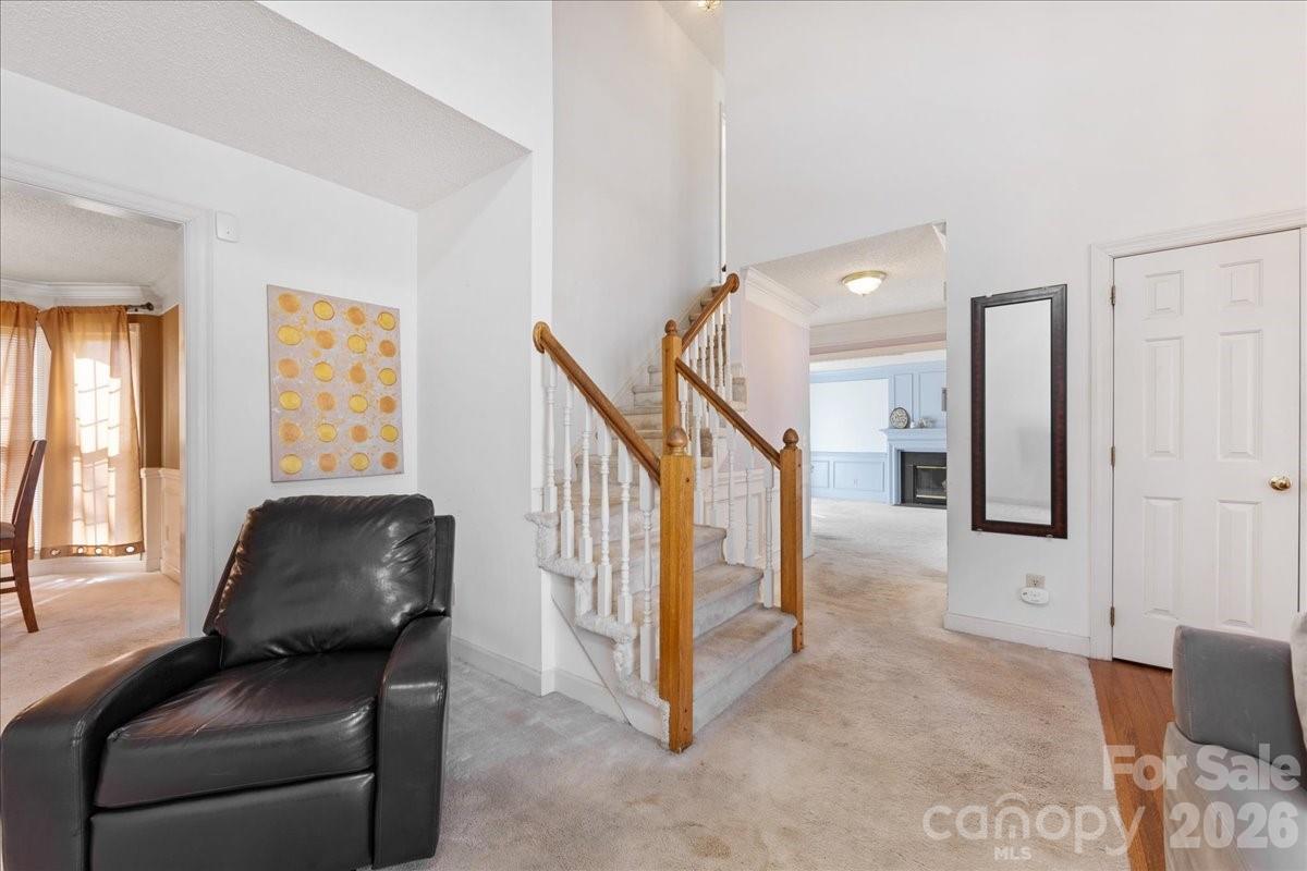 4107 Brownes Ferry Road Charlotte, NC 28269 - Photo 27 of 42 a living room with furniture and a window