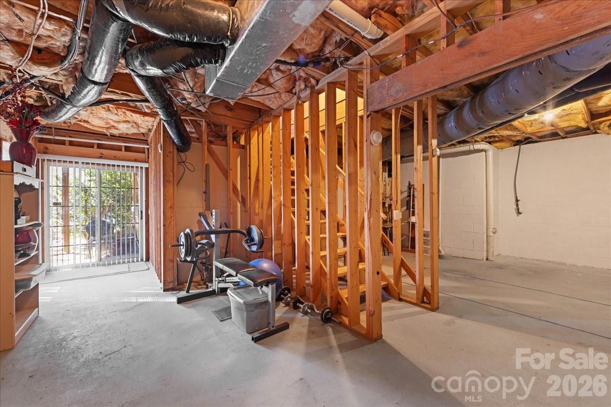 4107 Brownes Ferry Road Charlotte, NC 28269 - Photo 36 of 42 a view of a room with gym equipment