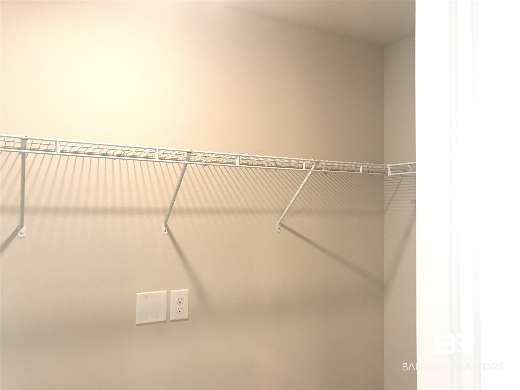 25806 Pollard Road, Unit 33 Daphne, AL 36526 - Photo 15 of 28 Master Walk-In Closet