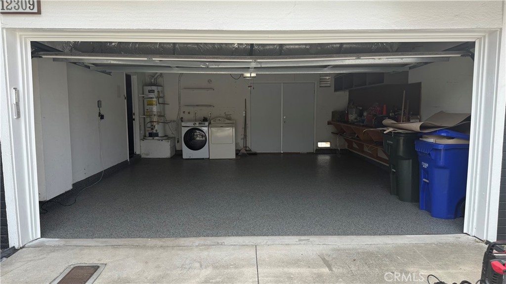 12309 Wintergreen Street Rancho Cucamonga, CA 91739 - Photo 32 of 32 Two car garage, convenient laundry area and work bench