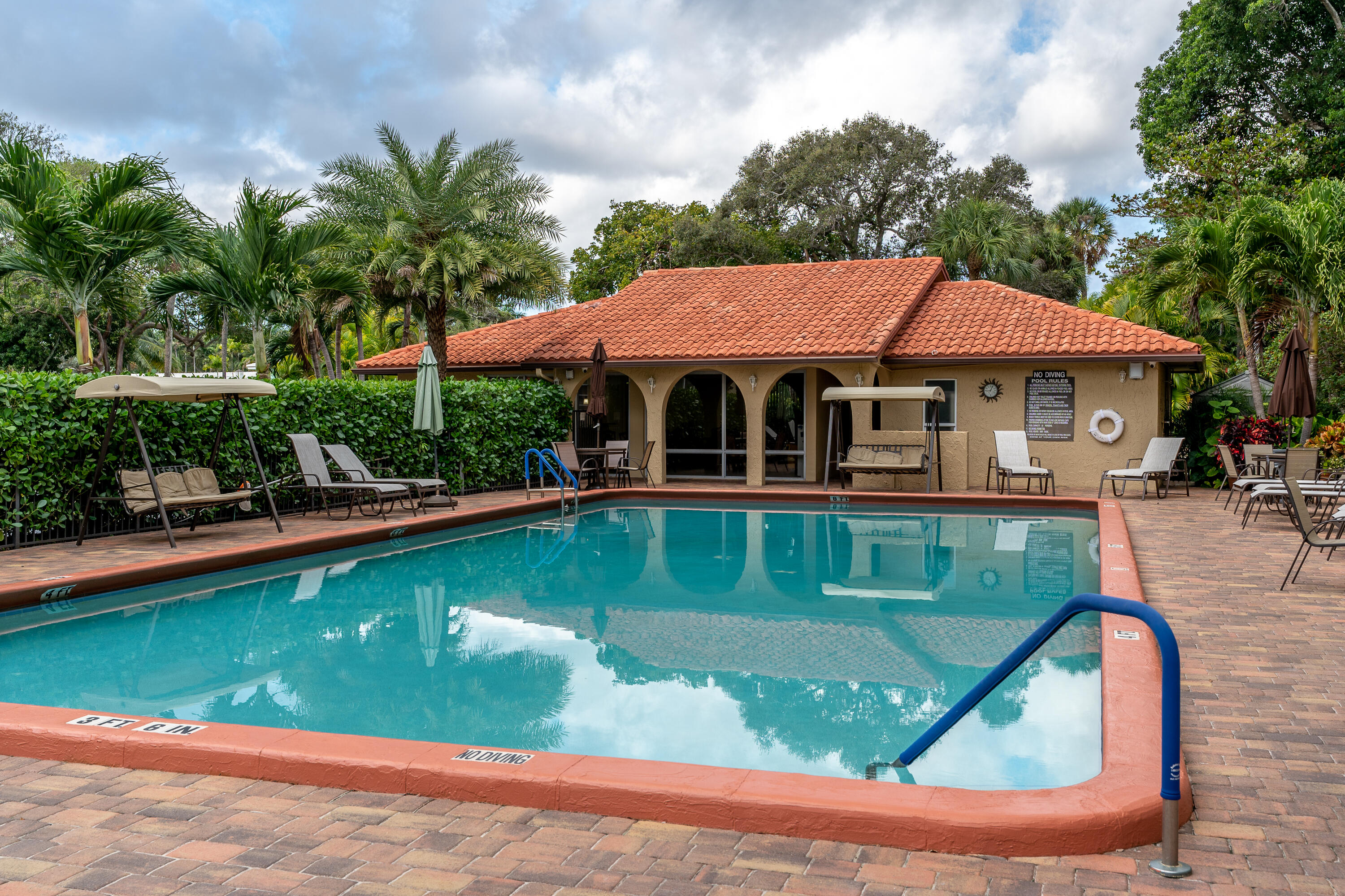 951 De Soto Road, Unit 427 Boca Raton, FL 33432 - Photo 28 of 44 a view of a house with swimming pool
