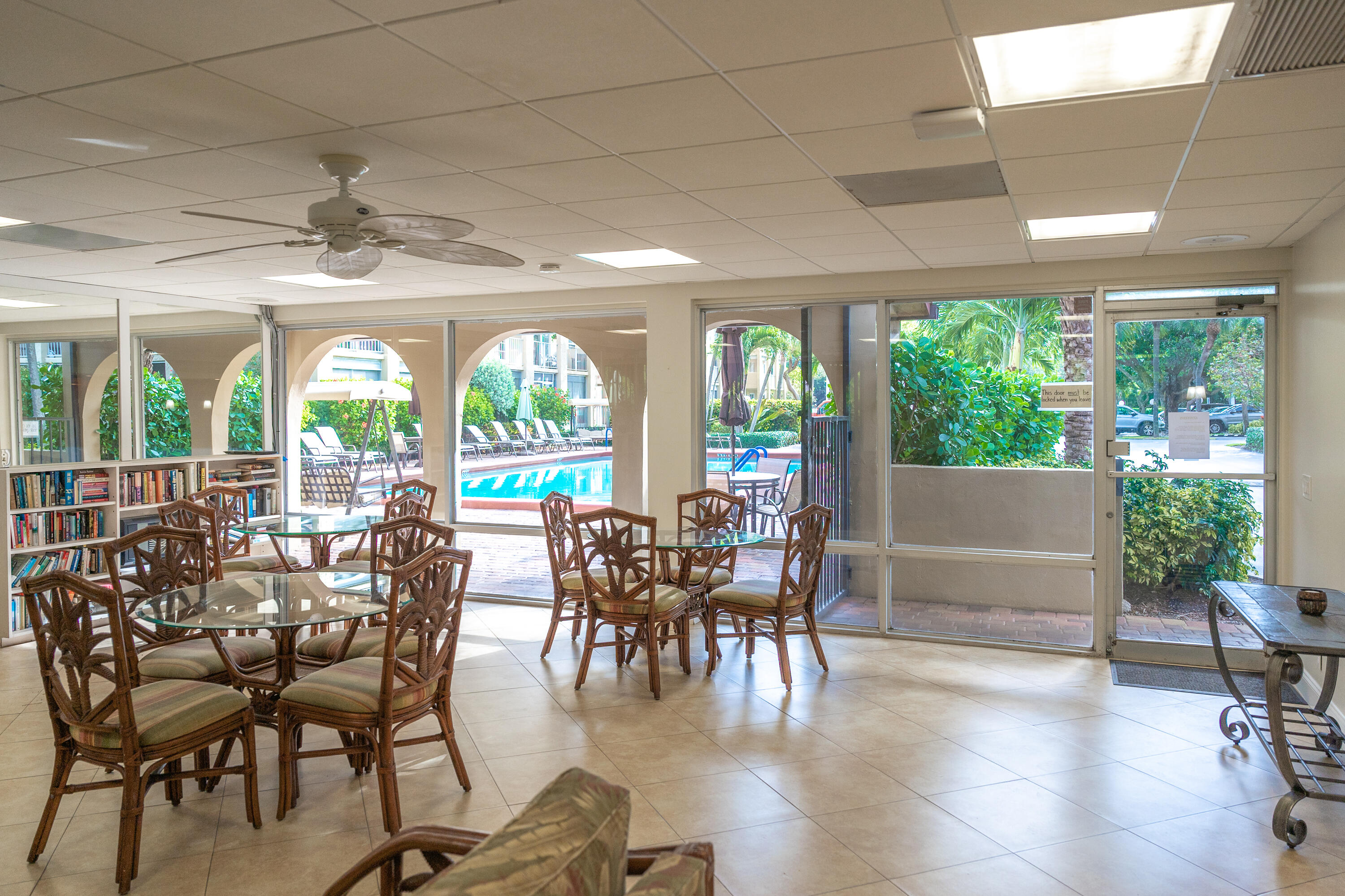 951 De Soto Road, Unit 427 Boca Raton, FL 33432 - Photo 30 of 44 a view of a dining room with furniture window and outside view