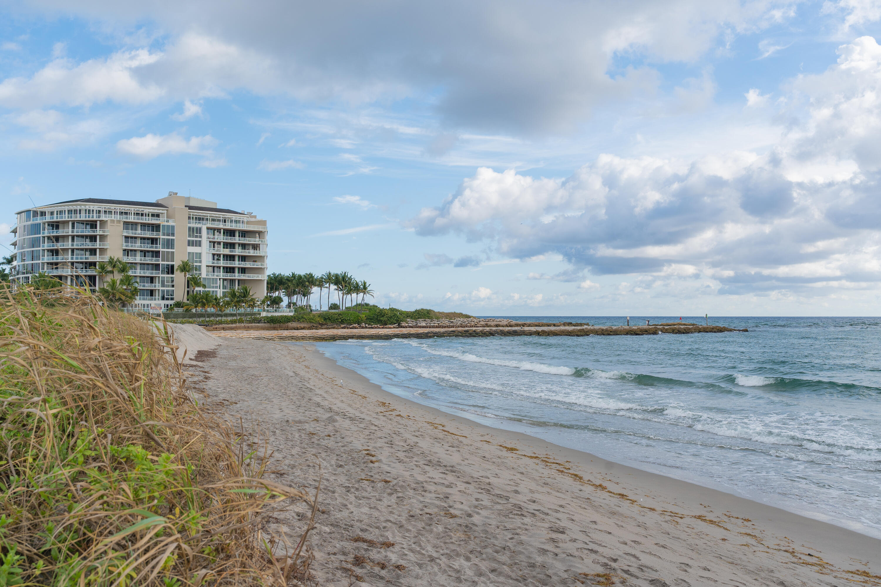 951 De Soto Road, Unit 427 Boca Raton, FL 33432 - Photo 43 of 44 a view of a lake with a building in the background