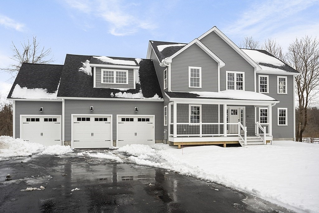 182 Davis Road Westminster, MA 01473 - Photo 1 of 42 a front view of a house with a yard