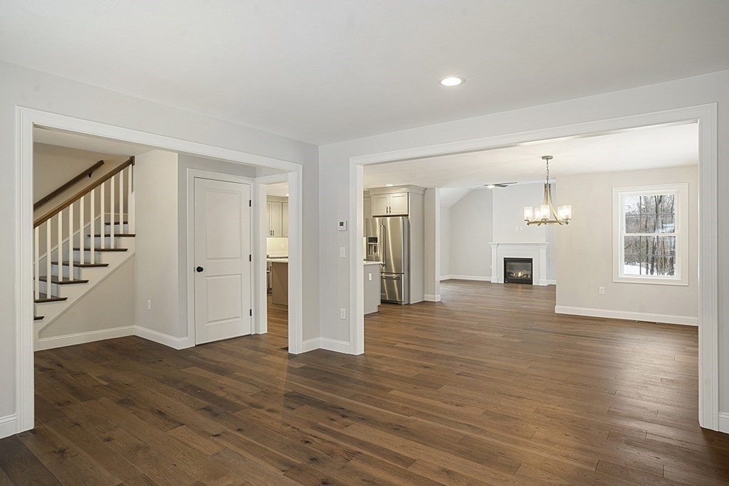 182 Davis Road Westminster, MA 01473 - Photo 16 of 42 a view of a house with wooden floor and fireplace