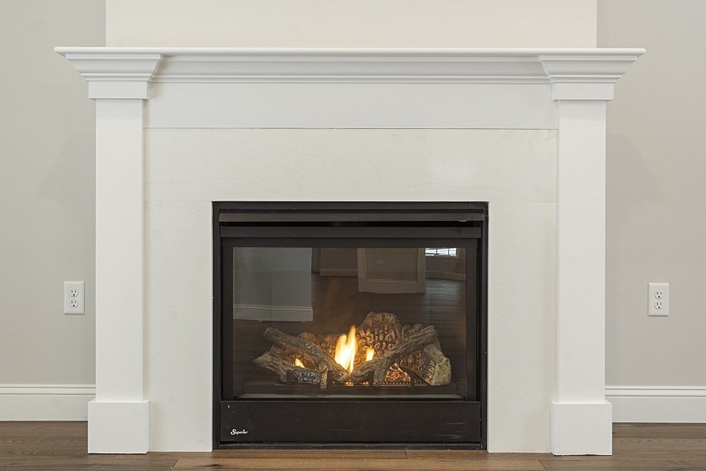 182 Davis Road Westminster, MA 01473 - Photo 21 of 42 a living room with a fireplace