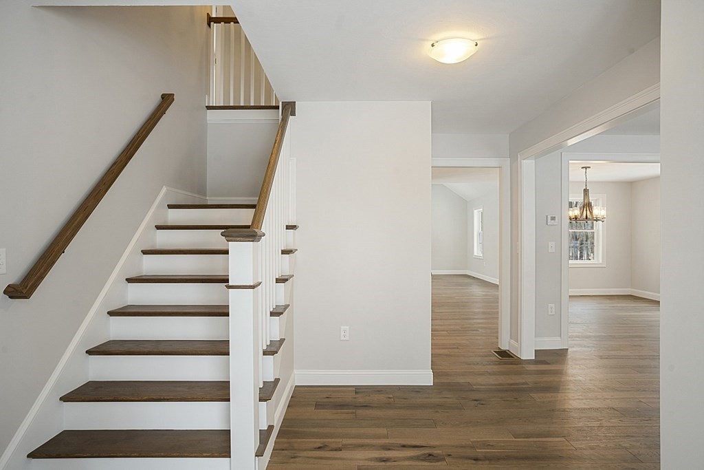 182 Davis Road Westminster, MA 01473 - Photo 26 of 42 a view of entryway with wooden floor and stairs