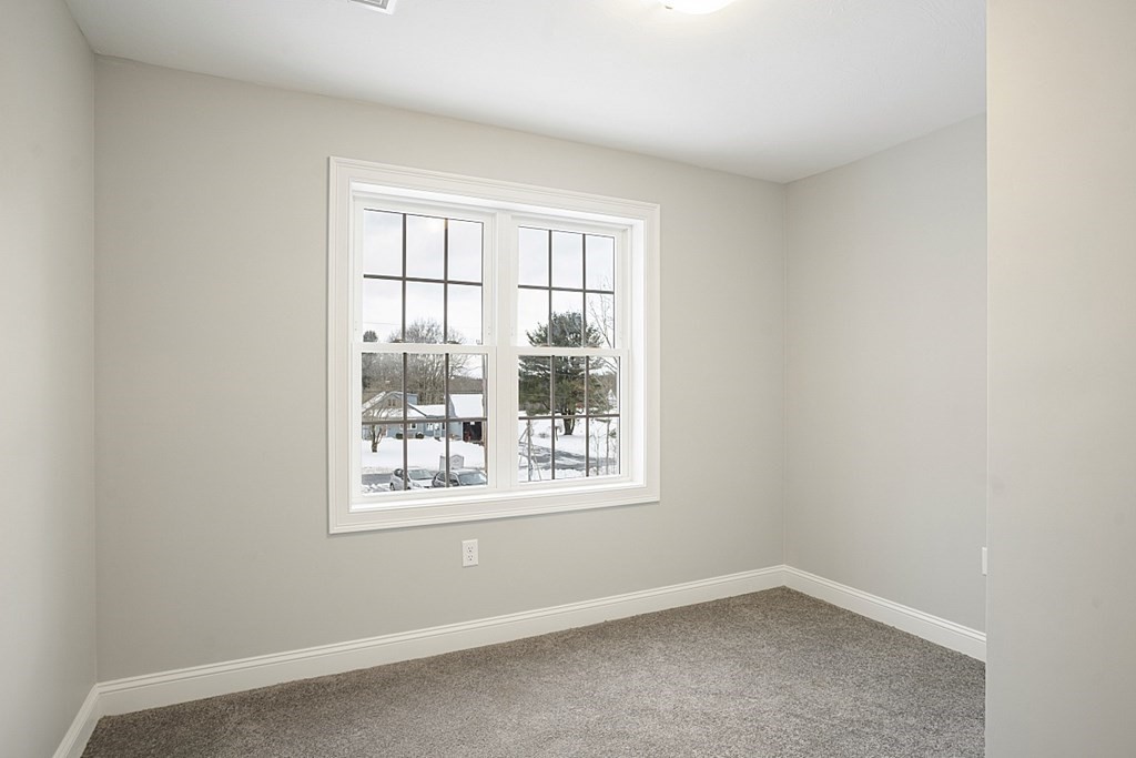 182 Davis Road Westminster, MA 01473 - Photo 33 of 42 an empty room with a window