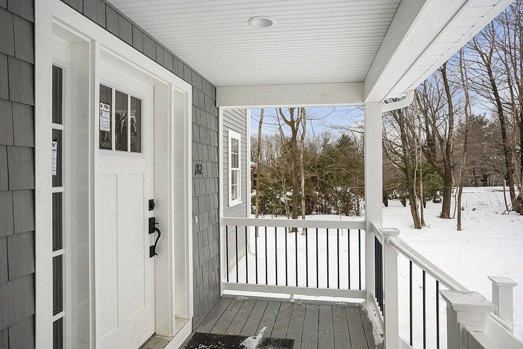 182 Davis Road Westminster, MA 01473 - Photo 4 of 42 a view of a porch with wooden floor and outdoor space