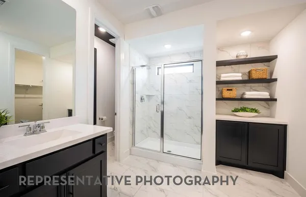 a view of a workspace and wooden floor