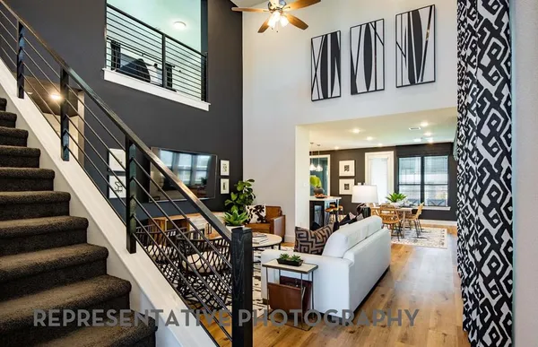 a living room with furniture or couch and a flat screen tv