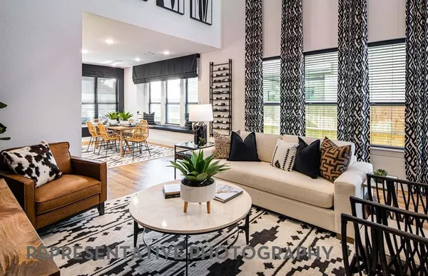 a bedroom with a bed and a night stand