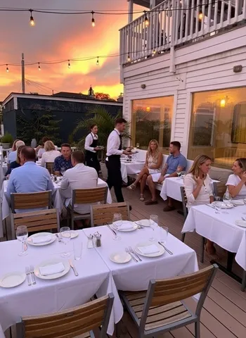 a balcony with furniture and a potted plant
