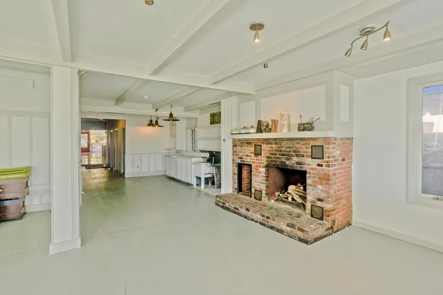 a balcony with view of swimming pool