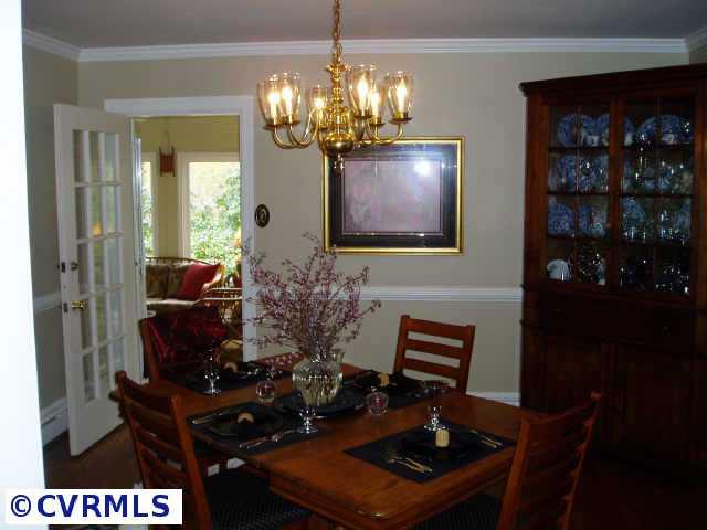 Other - Lovely dining room with hardwood floors, crown moulding and chair rail