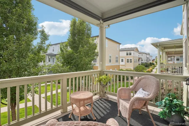 a view of balcony with furniture