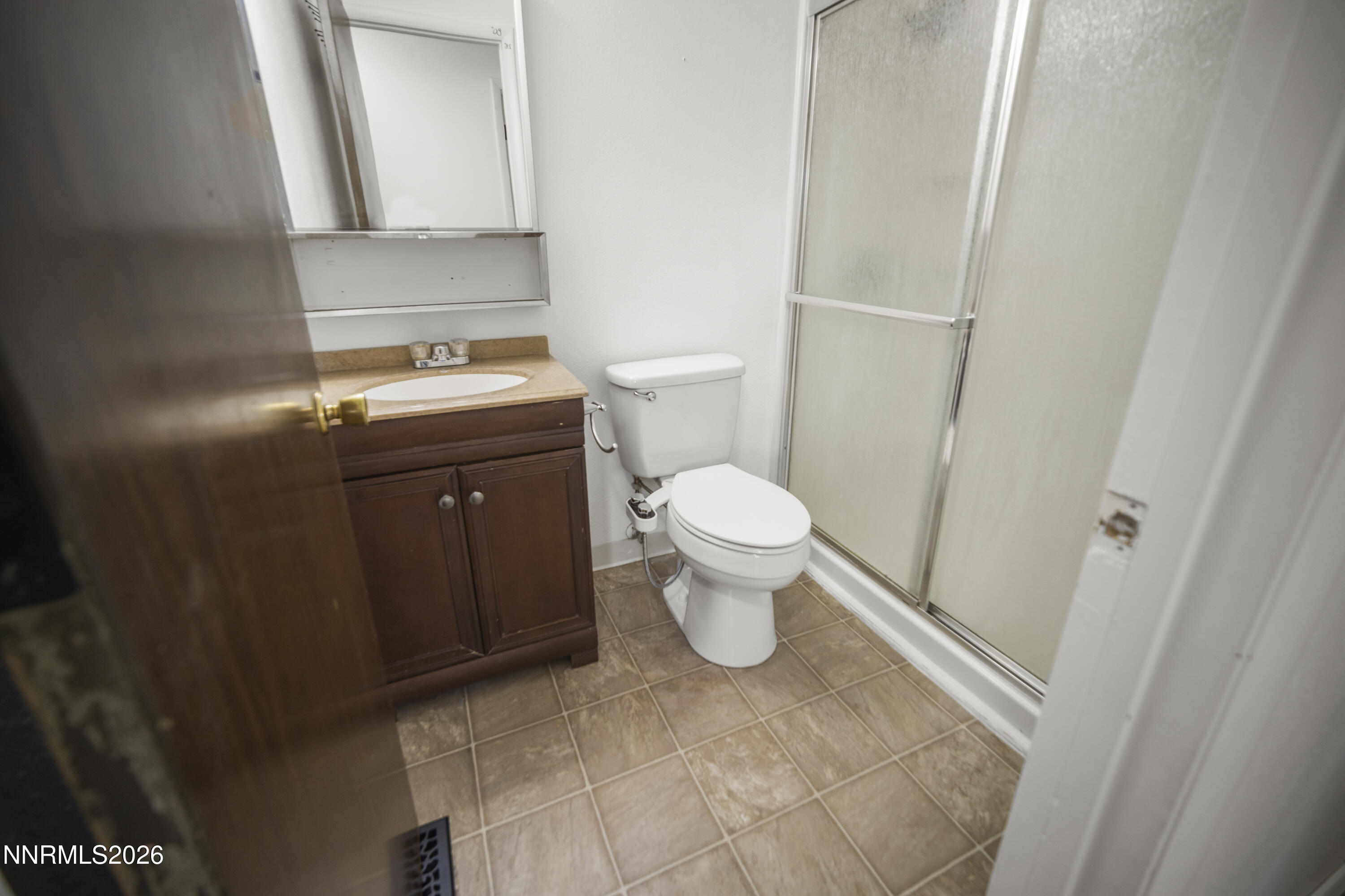 150 McCart Street Fernley, NV 89408 - Photo 17 of 28 a bathroom with a sink and a toilet