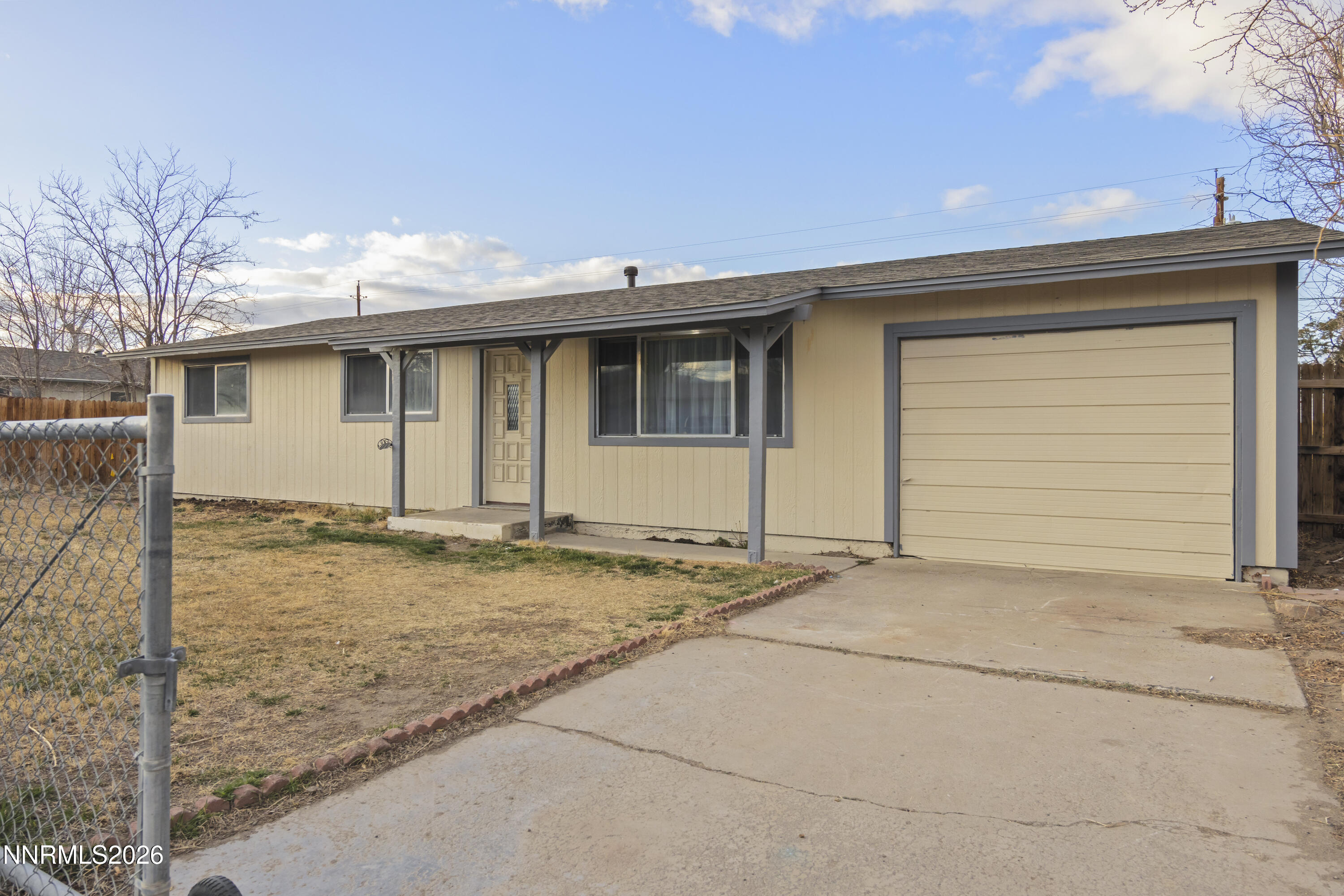 150 McCart Street Fernley, NV 89408 - Photo 3 of 28 a backyard of a house