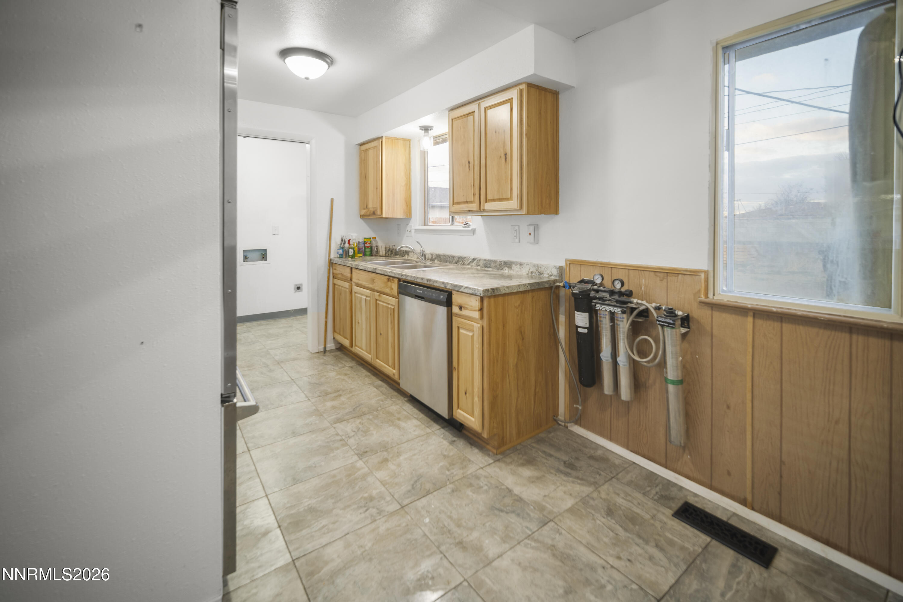 150 McCart Street Fernley, NV 89408 - Photo 9 of 28 a view of a kitchen with a sink