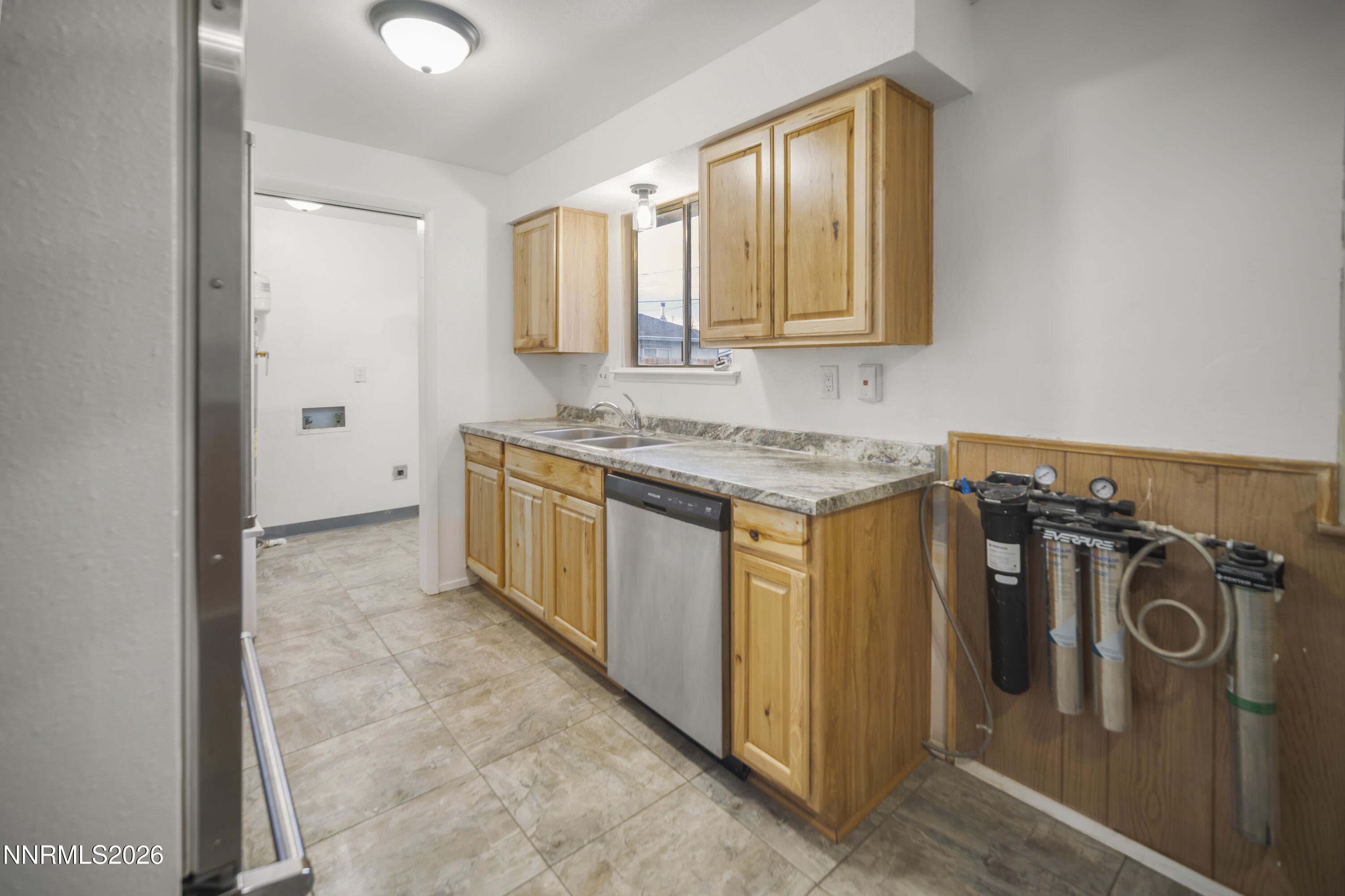 150 McCart Street Fernley, NV 89408 - Photo 10 of 28 a view of a kitchen with a sink