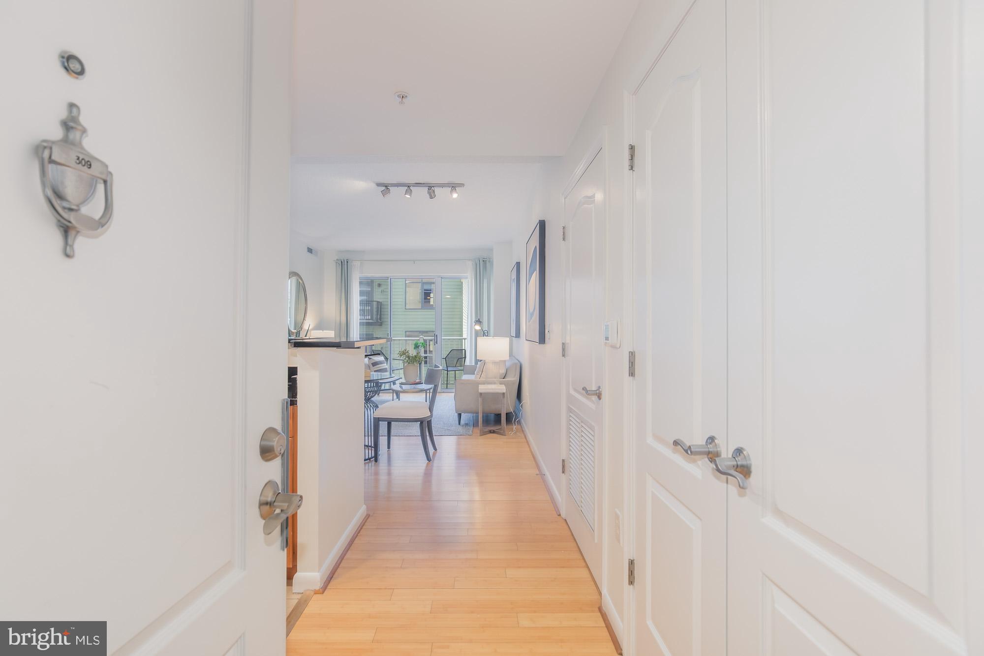 1111 11th Street Northwest, Unit 309 Washington, DC 20001 - Photo 2 of 18 a view of a room with wooden floor